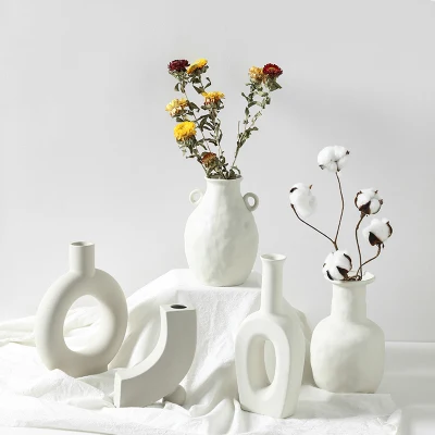 Accueil Vase à fleurs en céramique de luxe de forme irrégulière en porcelaine/verre/céramique/résine/poterie